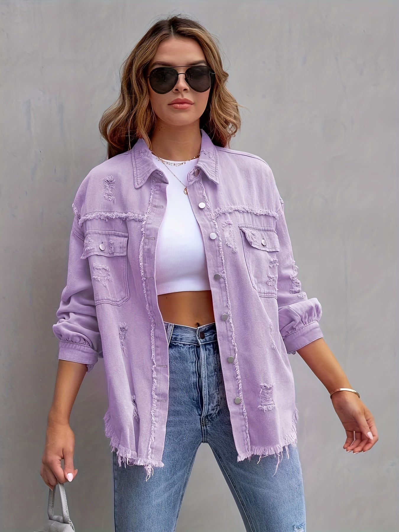Zerrissene denim-jacke in übergröße