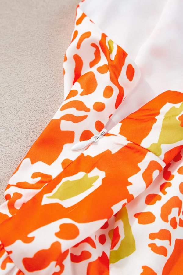 Zenda® | Orangefarbenes, gestuftes Kleid mit Leopardenmuster und geknoteten Trägern