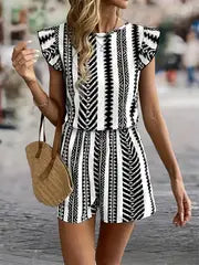 Aria - Eleganter gestreifter Print-Romper für Frauen