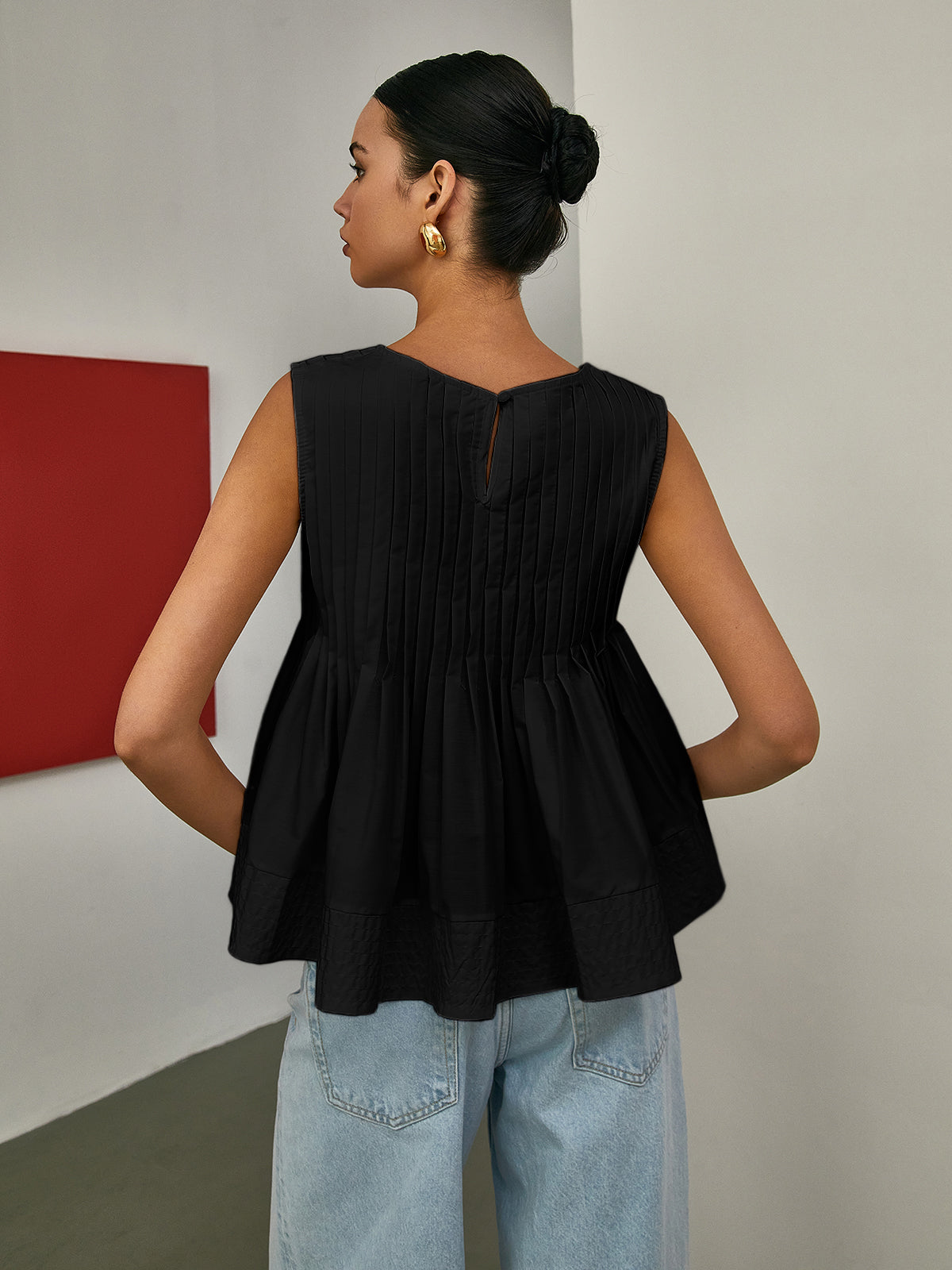 Ärmellose Plissee-Peplum-Bluse – Eleganter Taillenbetonter Look