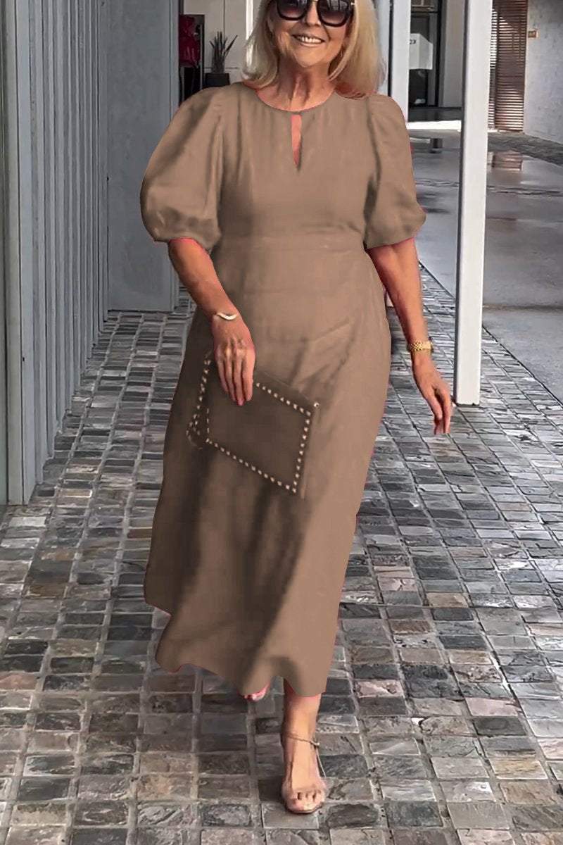 "Natalia | Zeitloses Eleganzkleid" could be rewritten as "Natalia | Klassisches Eleganzkleid".